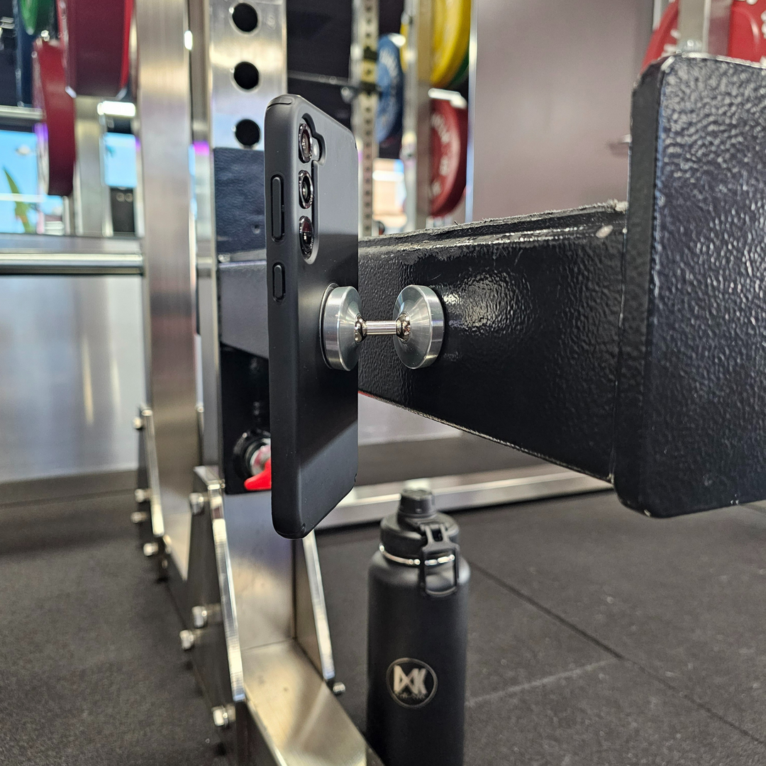 Mag Mount demonstration on Gym Equipment. Colour: Silver. IXK Gear Hot and cold Bottle in the background.