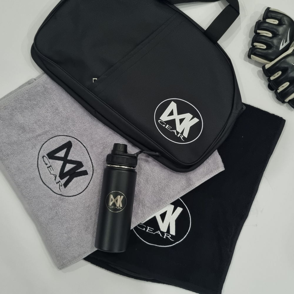 IXK Gear Gym Towel in Black and Grey. Also pictured IXK Gear Hot/Cold Bottle and Gym duffel.
