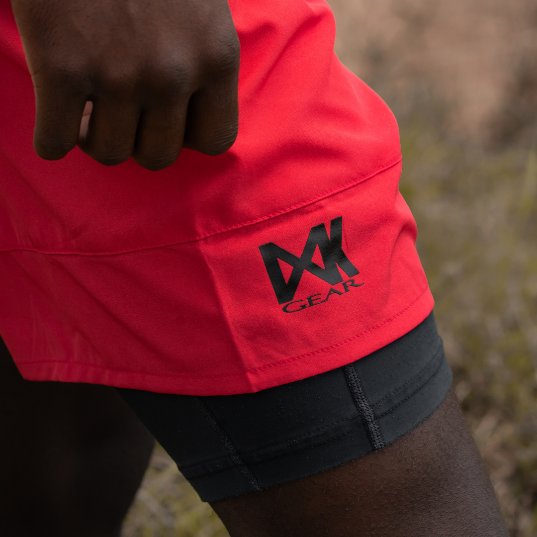 IXK Gear Quick Dry Accent Shorts in Colour: Red. Natural background.