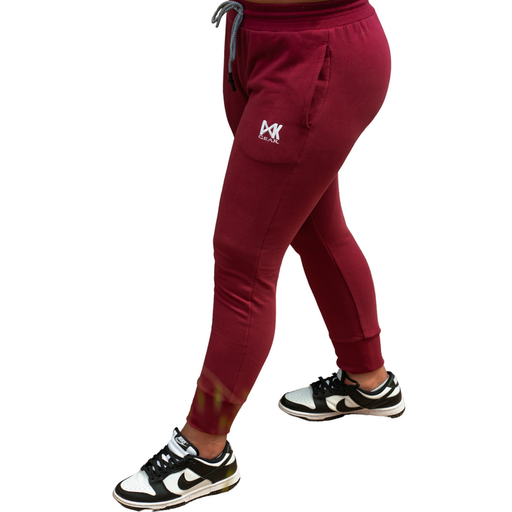 IXK Gear Women's Cropped Trackies in Colour: Maroon. Plain white background.